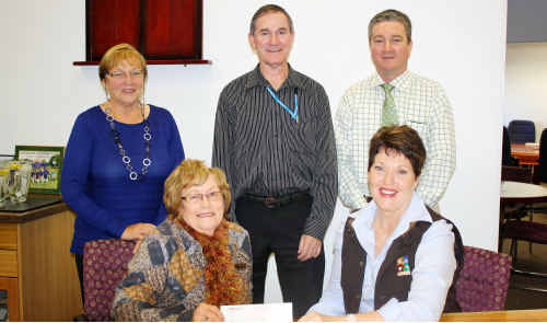 Lorna Hicks (front left) with CHDC general manager Sandra Hobbs (seated), board members Gail Nixon and Bryan Ottone and flood recovery group chair Kerry Hayes. Lorna Hicks (front left) with CHDC general manager Sandra Hobbs (seated), board members Gail Nixon and Bryan Ottone and flood recovery group chair Kerry Hayes.